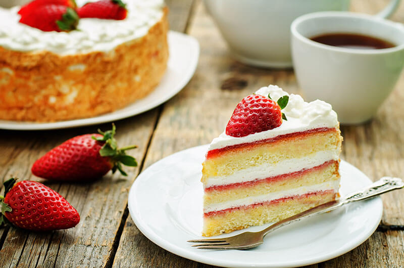cake with cream and strawberries