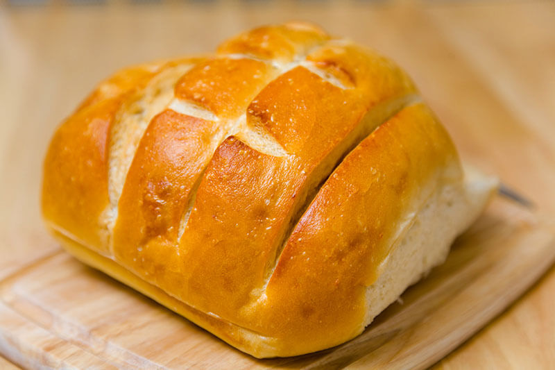 One loaf of uncut sourdough bread