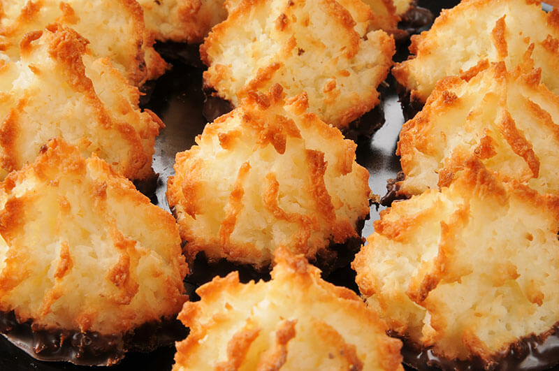 Close up of a plate of coconut macaroons, selective focus on center cookie